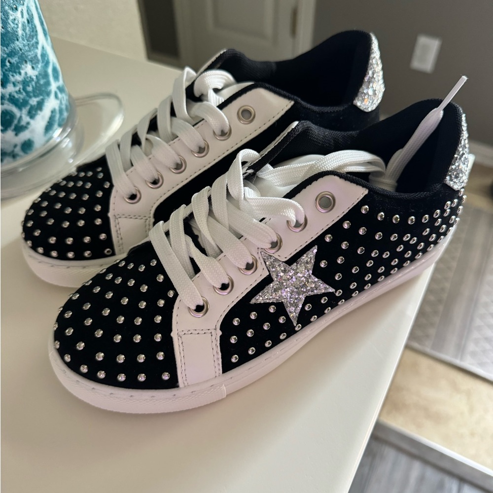 Black and white studded sneakers